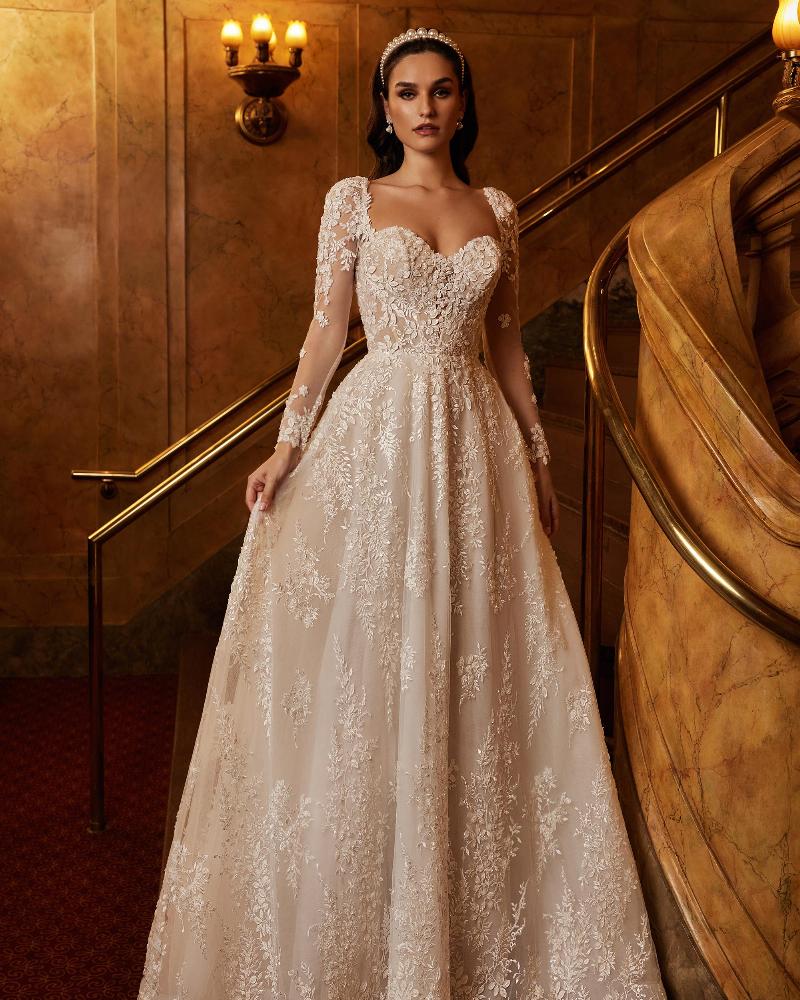 122118 long sleeve beaded wedding dress with pockets and a line silhouette1